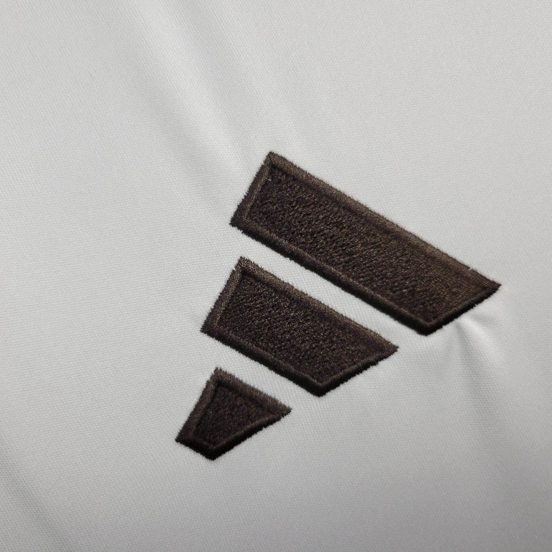 Camisa Real de Madrid I 25/26 - Torcedor Adidas Masculina - Branca com detalhes em cinza e amarelo