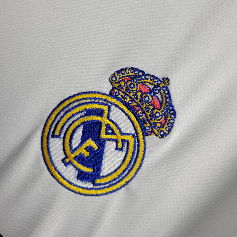 Camisa Real de Madrid I 25/26 - Torcedor Adidas Masculina - Branca com detalhes em cinza e amarelo