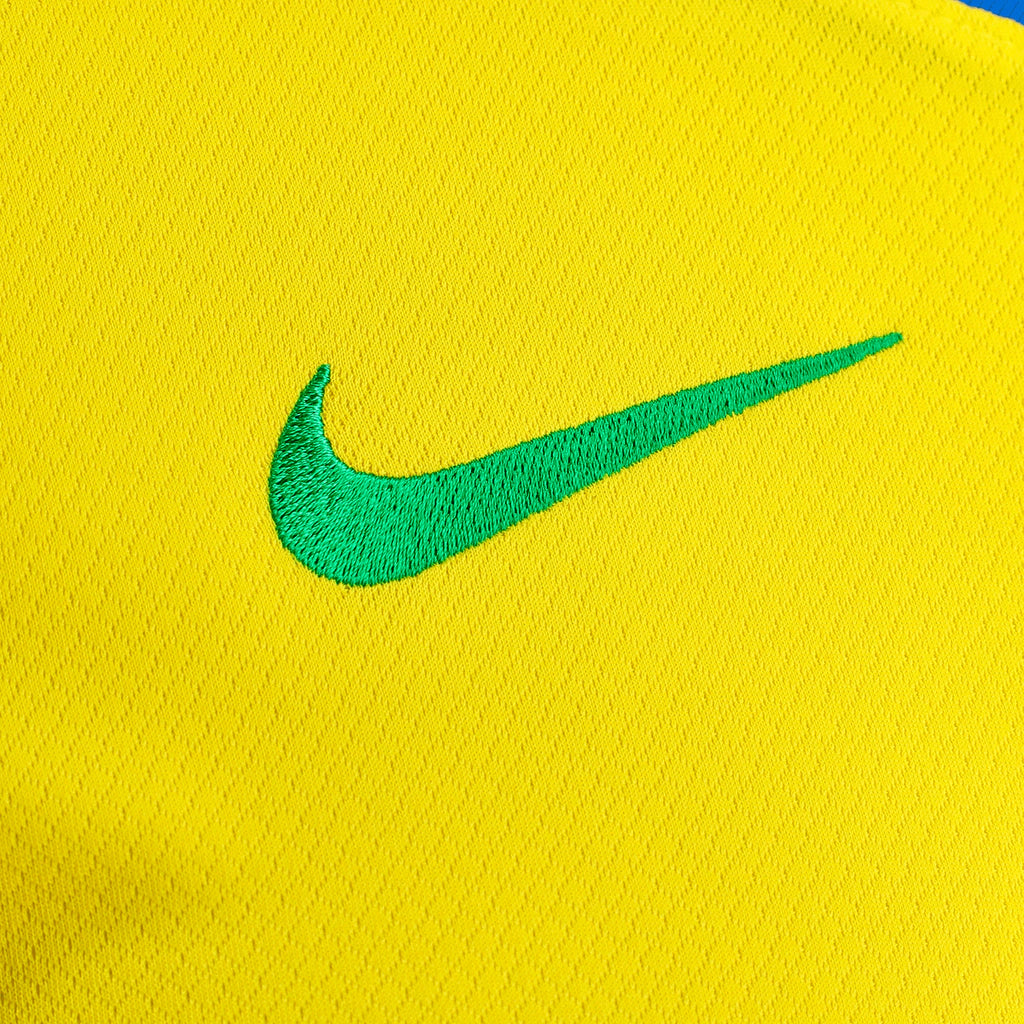 Camisa Seleção Brasileira I 25/26 - Torcedor Nike Feminina - Amarela com detalhes em verde